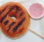 Tradition: This glazed grilled donut with strawberry mint dressing is served in classic state fair fashion on a stick